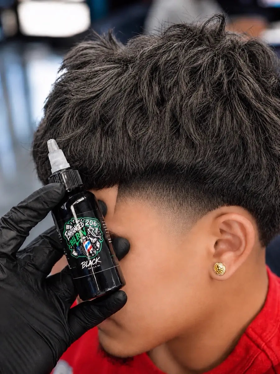 A gloved barber holds the 206 Black bottle beside a client's freshly bladed taper