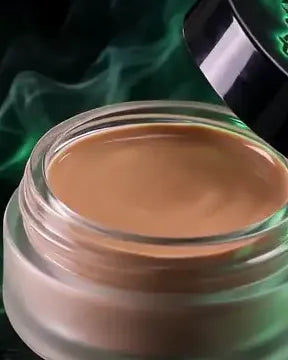 The Line Up Concealer jar with its lid tilted open